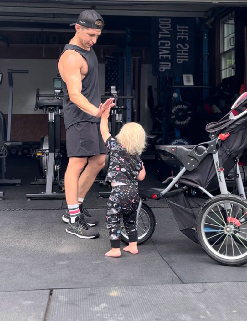 Coach giving hischild a high five.